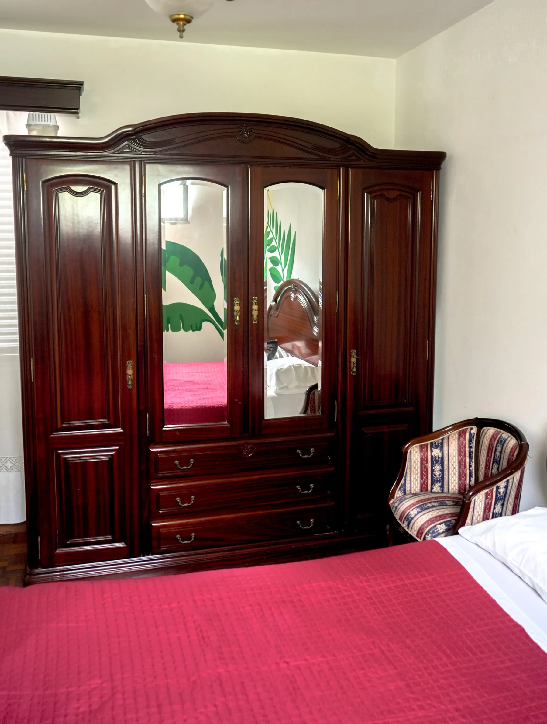 Fusilli mirrored wooden wardrobe and armchair