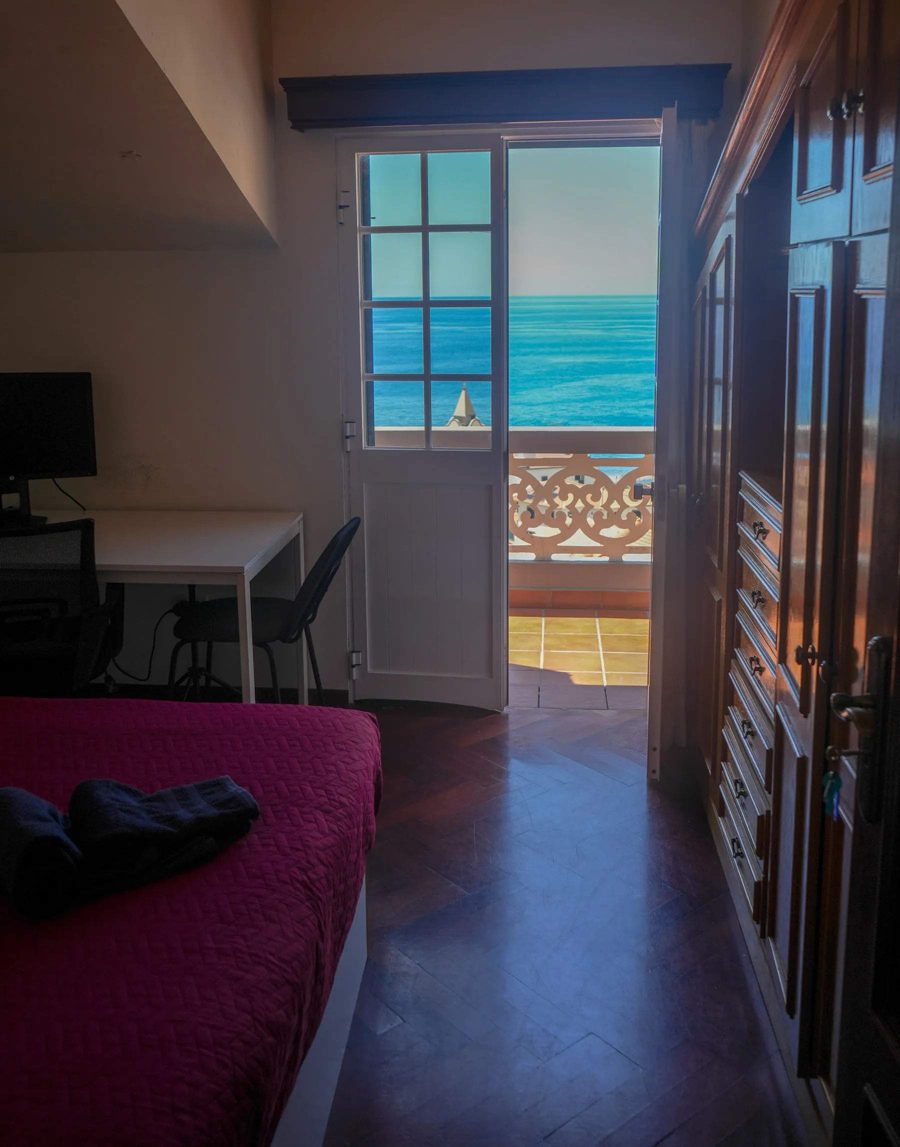 Bucatini bedroom opening onto the ocean-facing balcony